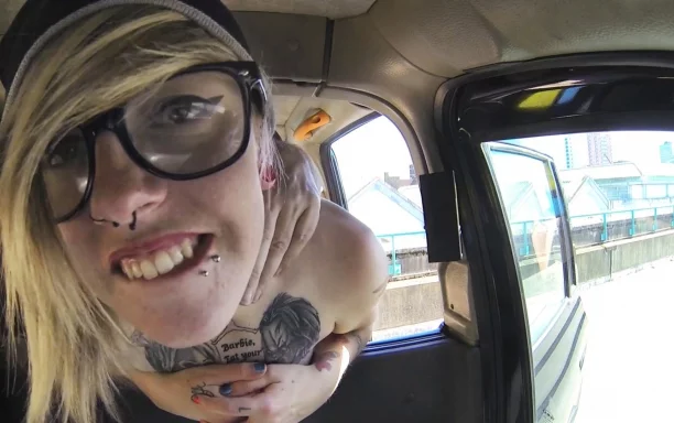 Blonde with glasses and big tattoos